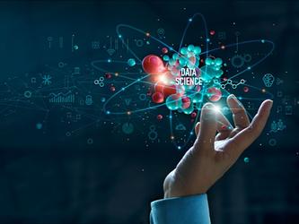 Hand of programmer touching and analysing development at various information on interface